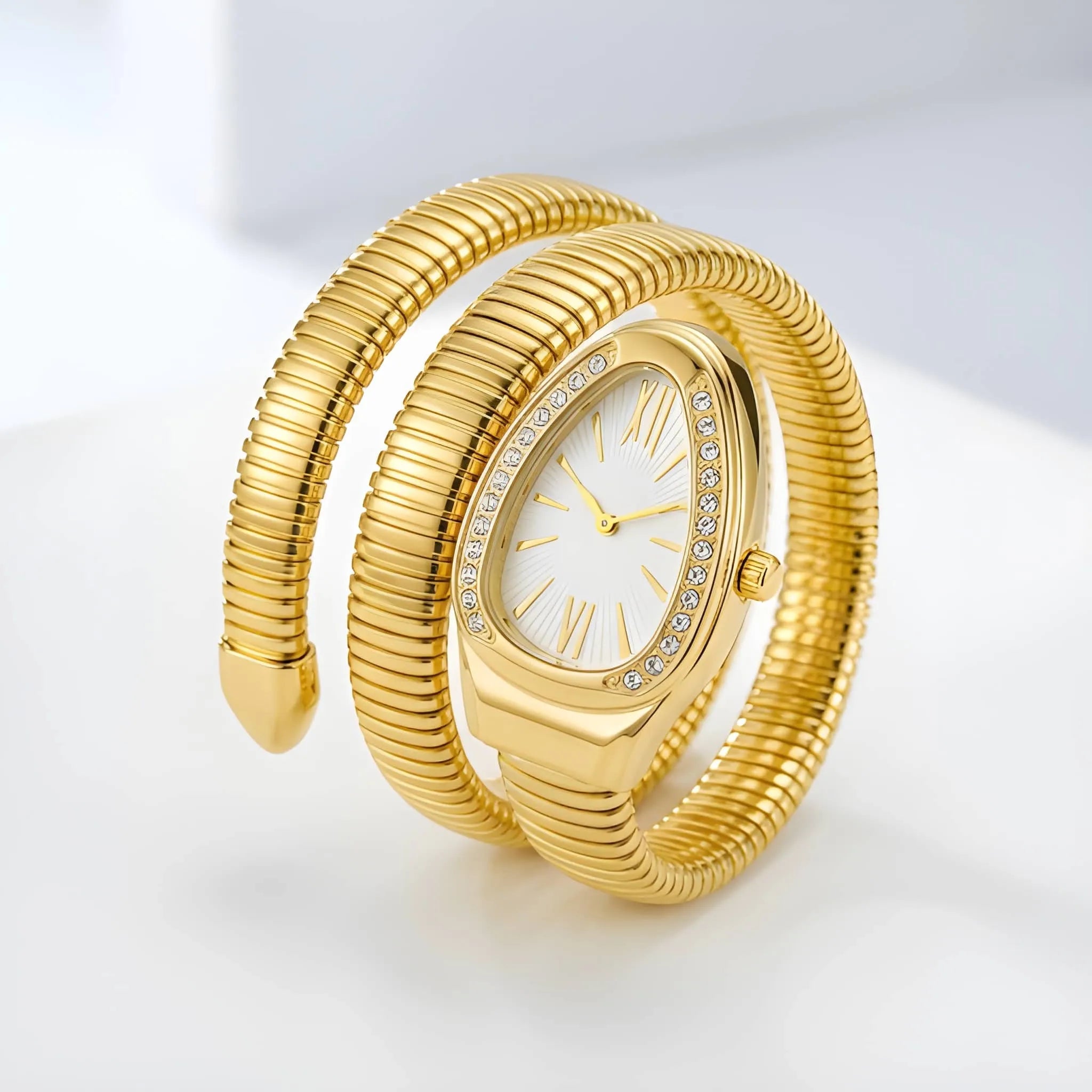 Serpentine Gold Watch